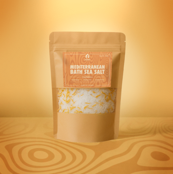 Mediterranean Bath Sea Salt Calendula in glass jar with floating petals