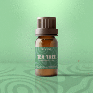 ALKIDO Tea Tree Pure Essential Oil in amber 10ml bottle with green label on mint background.