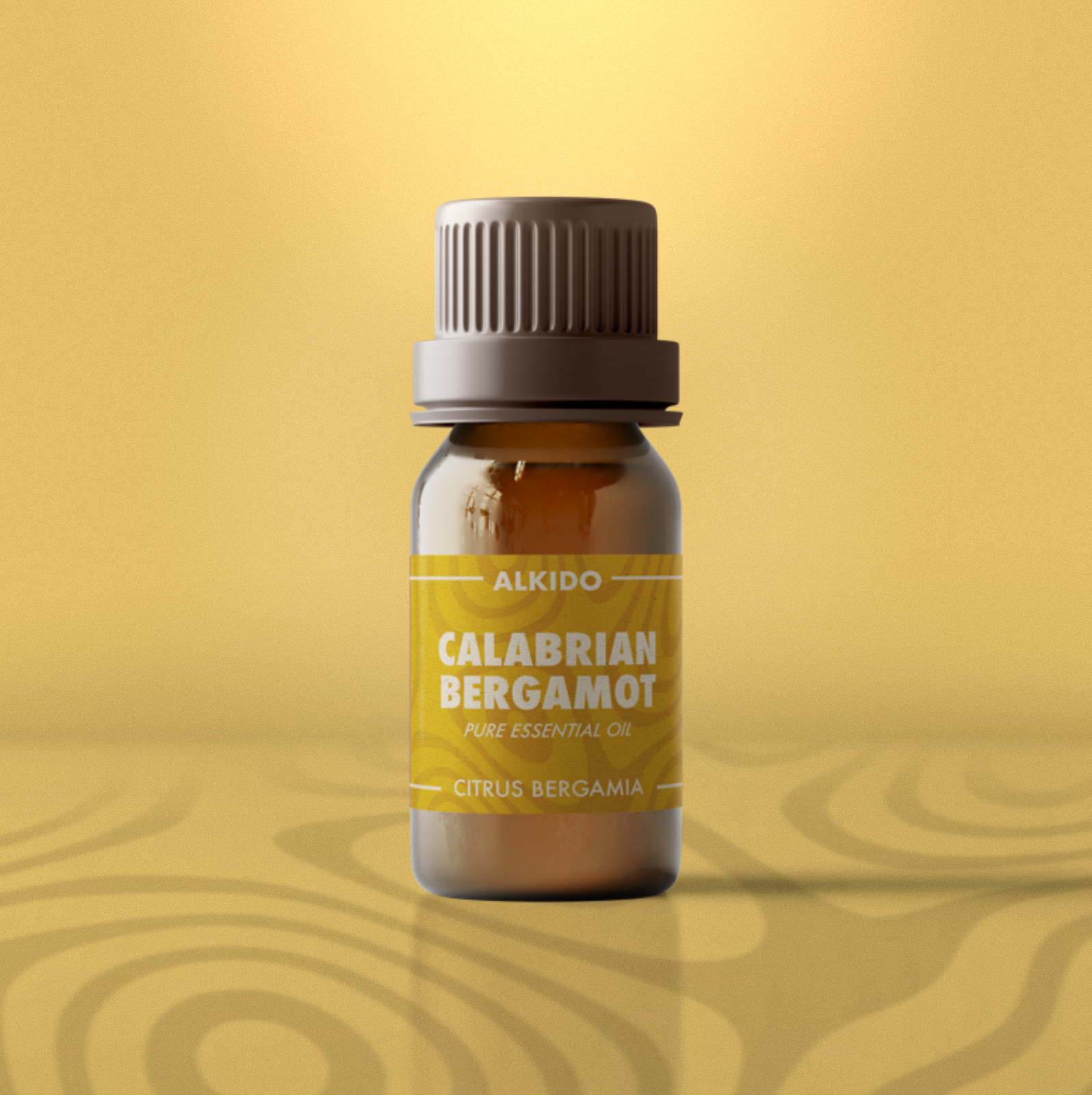 ALKIDO Calabrian Bergamot Pure Essential Oil in amber 10ml bottle with bold yellow label on golden background.