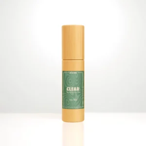 ALKIDO CLEAR Nail and Cuticle Oil in a bamboo roller bottle with a green label on a light background