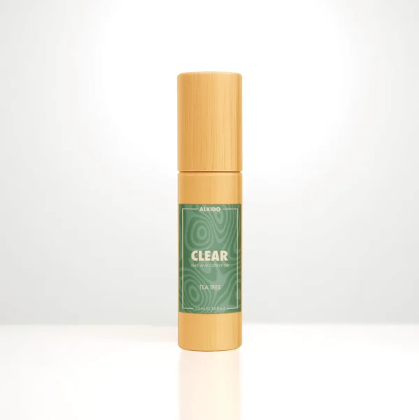 ALKIDO CLEAR Nail and Cuticle Oil in a bamboo roller bottle with a green label on a light background