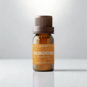 ALKIDO Clementine pure essential oil in an amber glass bottle with an orange label and brown cap on a light background