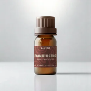 ALKIDO Frankincense organic essential oil in an amber glass bottle with a brown-red label and brown cap on a light background