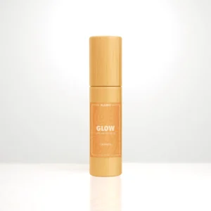 ALKIDO GLOW Nail and Cuticle Oil in a bamboo roller bottle with an orange label on a light background