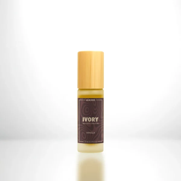 ALKIDO IVORY Nail and Cuticle Oil in a bamboo roller bottle with a dark label on a light background