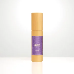 ALKIDO MIST Nail and Cuticle Oil in a bamboo roller bottle with a purple label on a light background