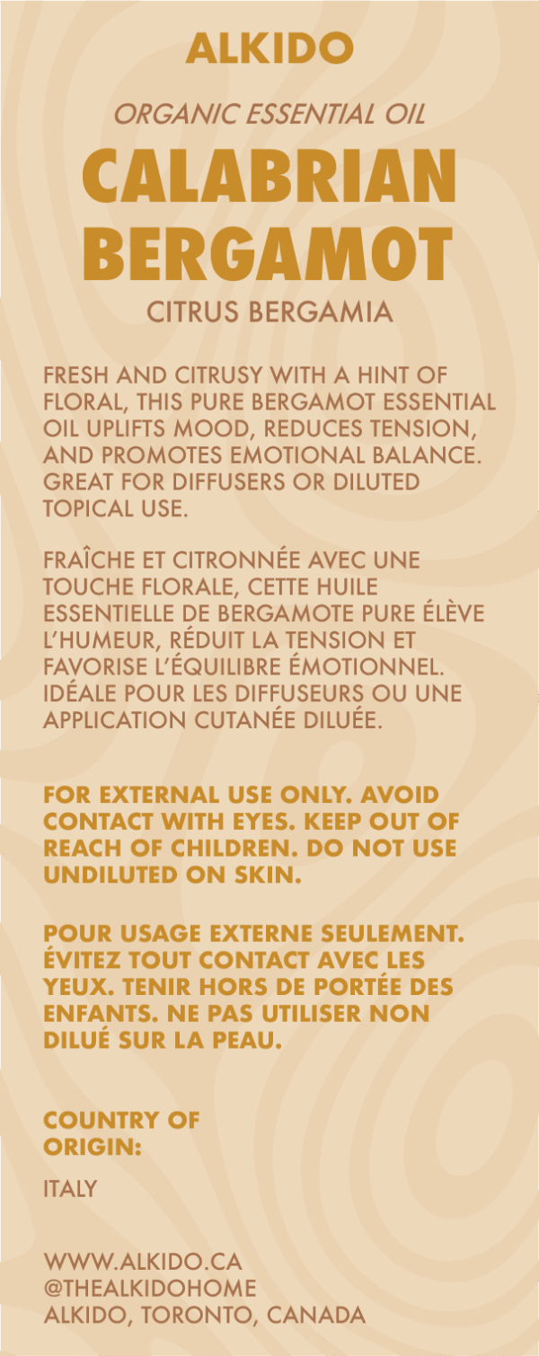 ALKIDO Calabrian Bergamot Organic Essential Oil label featuring safety information in English and French, emotional benefits like mood-lifting and tension relief, botanical name (Citrus Bergamia), and country of origin Italy. Warm citrus-themed design.