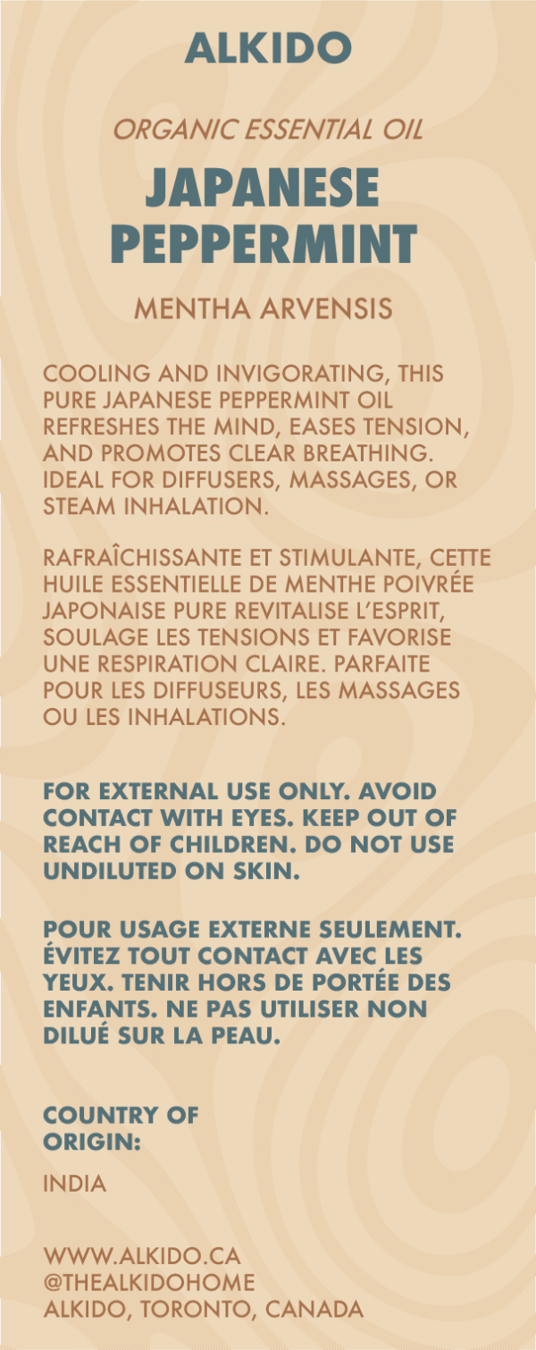 ALKIDO Japanese Peppermint Organic Essential Oil label featuring the botanical name Mentha Arvensis. Describes invigorating and cooling benefits for diffusers, massages, or steam inhalation. Includes bilingual safety warnings and indicates India as the country of origin. Soft beige background with deep blue and brown text.