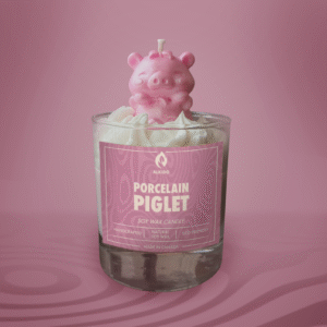 ALKIDO Porcelain Piglet Soy Wax Candle in soft white. Hand-poured, unscented, shaped like a small pig. Vegan, eco-friendly, made in Canada.
