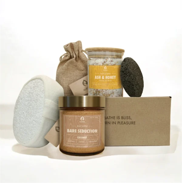 ALKIDO Tropical mist try it all set with scrub jar, bath sponge, lava stone, linen pouch, bath salt jar, and branded box on a light background
