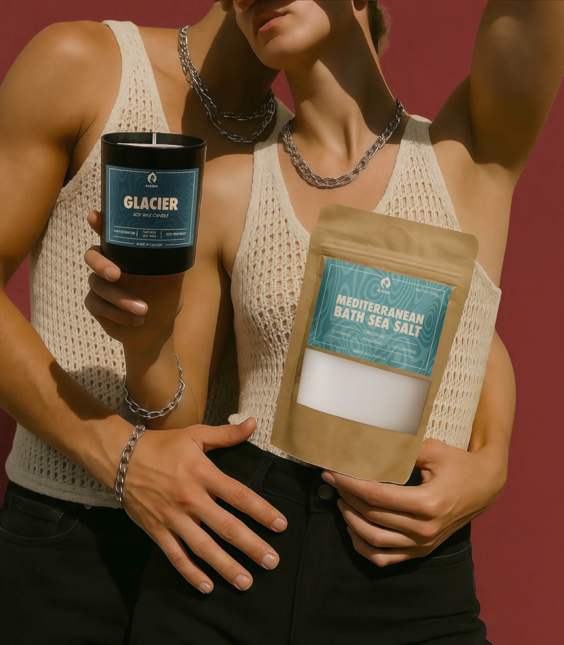 male and female models holding glacier candle and mediterranean bath sea salt