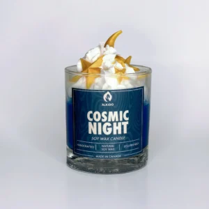 Decorative candle with stars and moon decor on top and a blue label