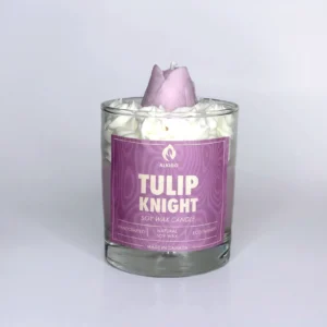 Decorative candle with a big tulip flower decor on top and a purple label